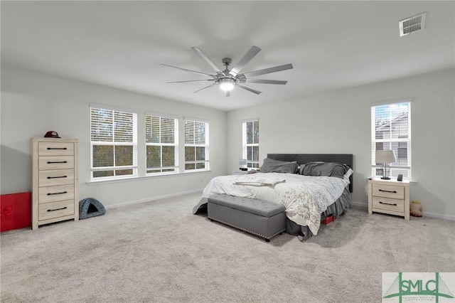 64 Southern Way, Richmond Hill, GA 31324 - bedroom with multiple windows, carpet flooring, and baseboards