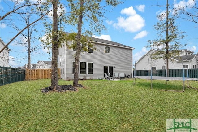 64 Southern Way, Richmond Hill, GA 31324 - back of property with a trampoline