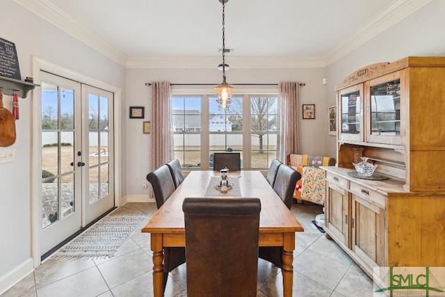 4 Honeysuckle Dr, Claxton, GA 30417 - dining room featuring french doors, light tile patterned floors, crown molding, and a water view