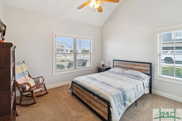4 Honeysuckle Dr, Claxton, GA 30417 - carpeted bedroom with multiple windows, ceiling fan, and high vaulted ceiling