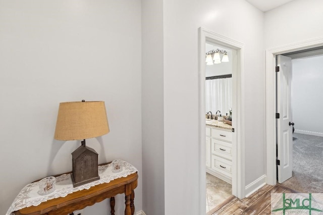4 Honeysuckle Dr, Claxton, GA 30417 - hall with baseboards and light wood-style flooring