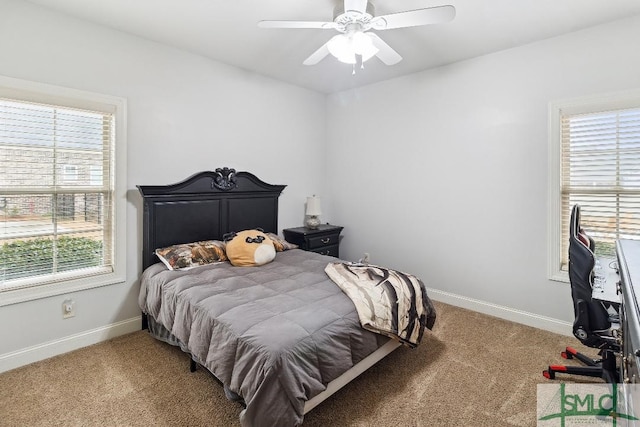 4 Honeysuckle Dr, Claxton, GA 30417 - carpeted bedroom with baseboards and a ceiling fan