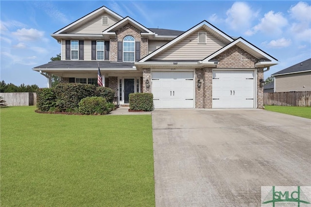 309 Nashview Trl, Allenhurst, GA 31301 - view of front of property with driveway, an attached garage, and brick siding