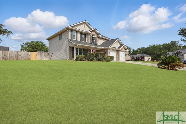 309 Nashview Trl, Allenhurst, GA 31301 - traditional home with driveway and an attached garage