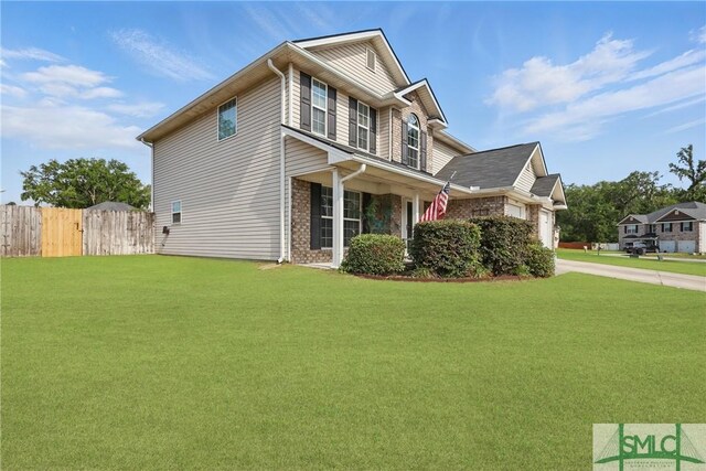 309 Nashview Trl, Allenhurst, GA 31301 - view of side of home with concrete driveway, an attached garage, and brick siding