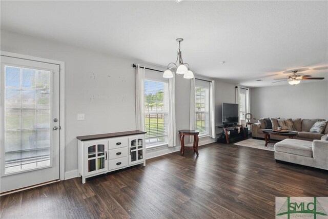 309 Nashview Trl, Allenhurst, GA 31301 - living area featuring wood finished floors, a ceiling fan, and baseboards