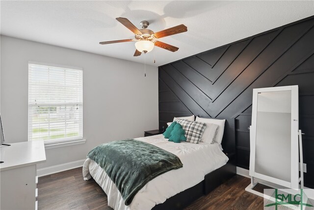 309 Nashview Trl, Allenhurst, GA 31301 - bedroom featuring dark wood finished floors, baseboards, and a ceiling fan