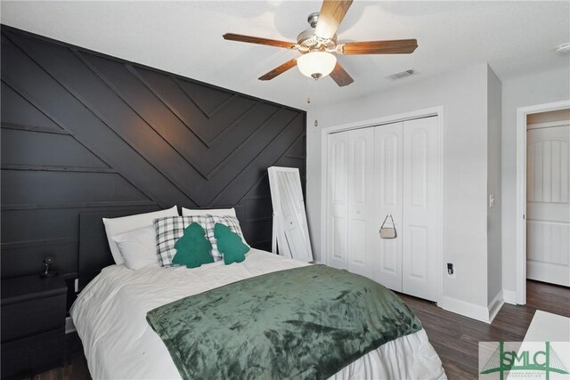 309 Nashview Trl, Allenhurst, GA 31301 - bedroom with baseboards, a closet, wood finished floors, and ceiling fan