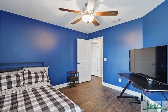 309 Nashview Trl, Allenhurst, GA 31301 - bedroom with wood finished floors, baseboards, and a ceiling fan
