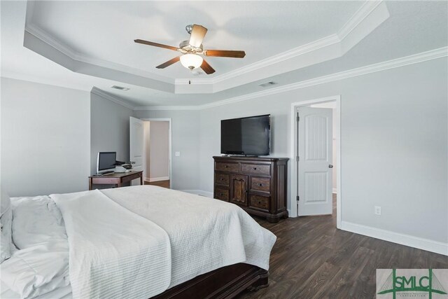 309 Nashview Trl, Allenhurst, GA 31301 - bedroom with a tray ceiling, dark wood-style flooring, crown molding, baseboards, and a ceiling fan