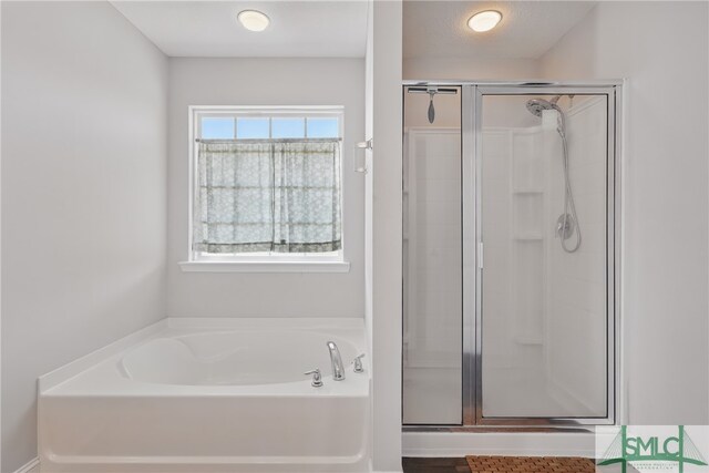 309 Nashview Trl, Allenhurst, GA 31301 - full bath with a stall shower and a bath