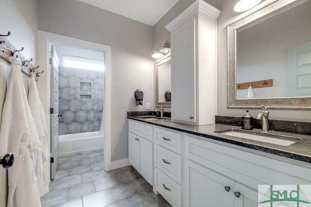 1840 Mccall Rd, Rincon, GA 31326 - full bathroom featuring double vanity, tub / shower combination, and baseboards