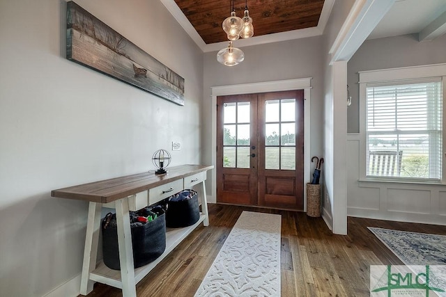 1840 Mccall Rd, Rincon, GA 31326 - entryway featuring french doors, wood finished floors, a decorative wall, wainscoting, and wooden ceiling