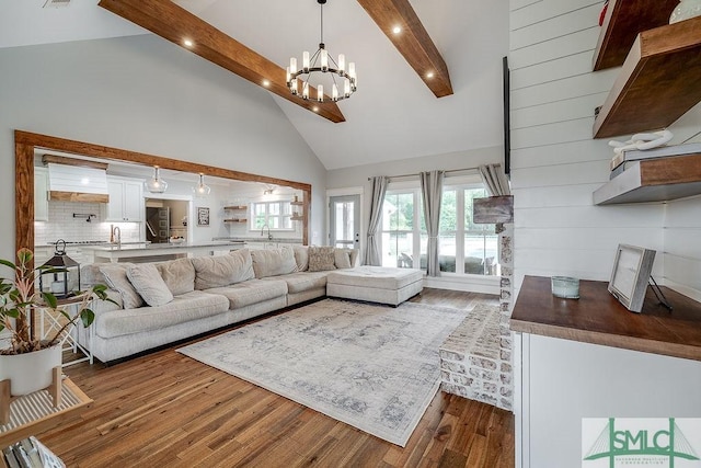 1840 Mccall Rd, Rincon, GA 31326 - living area featuring high vaulted ceiling, a chandelier, beamed ceiling, wood finished floors, and recessed lighting