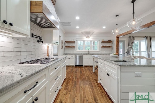 1840 Mccall Rd, Rincon, GA 31326 - kitchen with open shelves, stainless steel appliances, extractor fan, a sink, and hardwood / wood-style floors