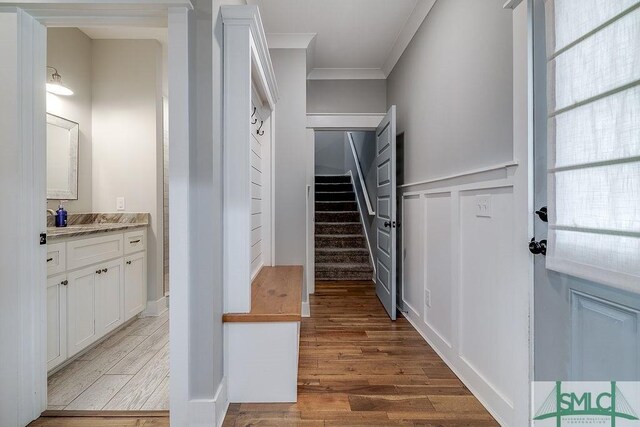 1840 Mccall Rd, Rincon, GA 31326 - foyer featuring crown molding, wood finished floors, and stairs
