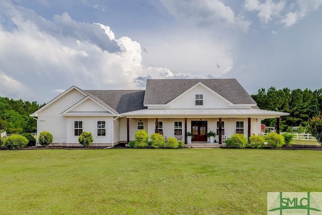 1840 Mccall Rd, Rincon, GA 31326 - modern farmhouse with a front yard, a shingled roof, covered porch, metal roof, and a standing seam roof