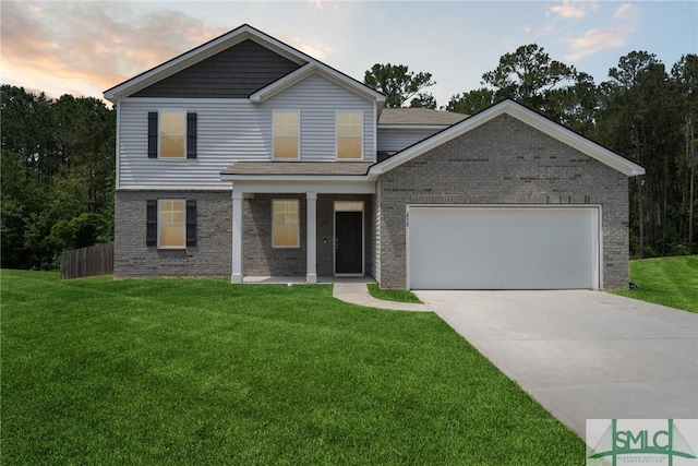 238 Sage Field Dr, Rincon, GA 31326 - view of front of house featuring brick siding, an attached garage, and driveway