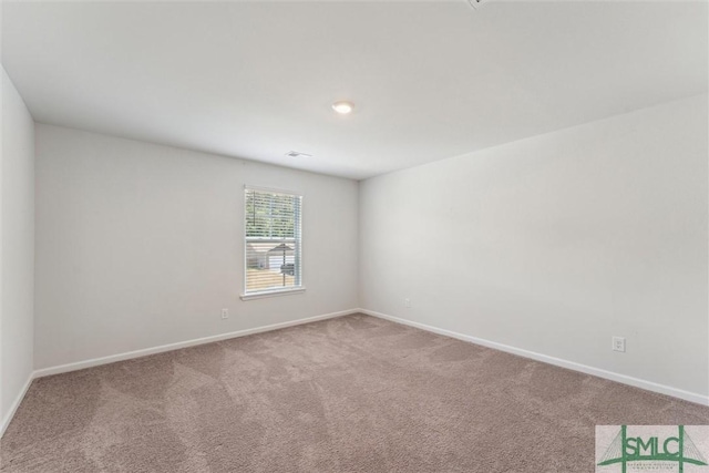 238 Sage Field Dr, Rincon, GA 31326 - spare room featuring carpet flooring and baseboards