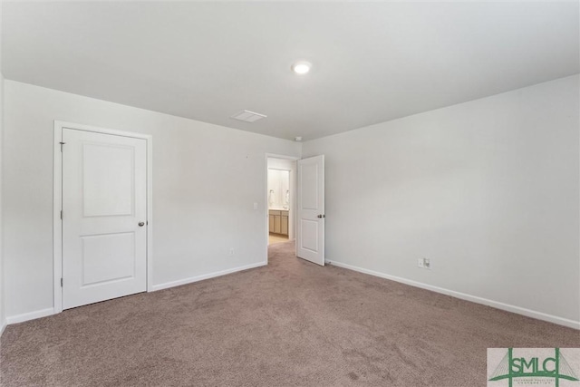 238 Sage Field Dr, Rincon, GA 31326 - unfurnished bedroom with carpet floors and baseboards