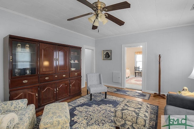 8 Georgia St, Pembroke, GA 31321 - sitting room with crown molding, a ceiling fan, and wood finished floors