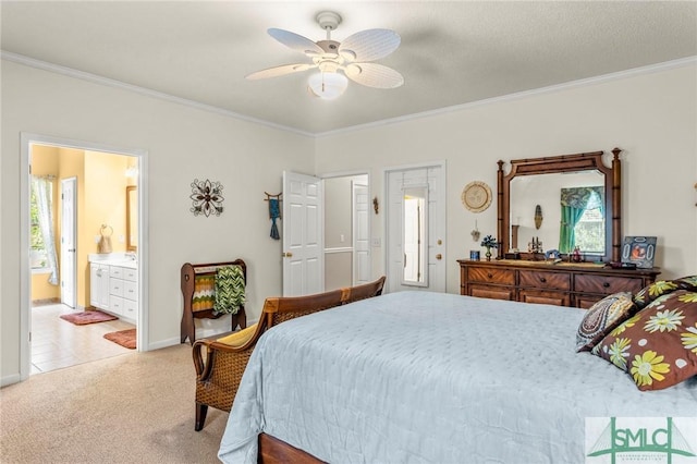 330 Central Ave, Guyton, GA 31312 - bedroom featuring crown molding, light carpet, connected bathroom, a ceiling fan, and baseboards