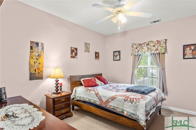 330 Central Ave, Guyton, GA 31312 - bedroom with carpet floors, baseboards, and ceiling fan