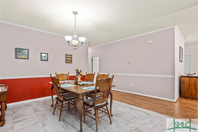 330 Central Ave, Guyton, GA 31312 - dining room featuring crown molding, a chandelier, and baseboards