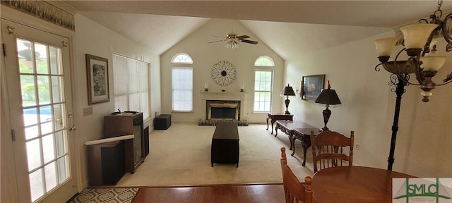 131 Farringdon Cir, Savannah, GA 31410 - living area with a ceiling fan, a brick fireplace, lofted ceiling, light wood-type flooring, and baseboards