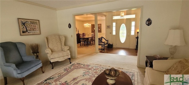 131 Farringdon Cir, Savannah, GA 31410 - carpeted foyer entrance featuring ornamental molding and a chandelier
