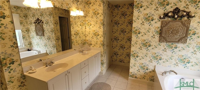 131 Farringdon Cir, Savannah, GA 31410 - full bath with tile patterned floors, a bath, baseboards, and double vanity
