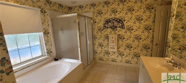 131 Farringdon Cir, Savannah, GA 31410 - bathroom with tile patterned flooring, baseboards, a shower stall, a bath, and vanity