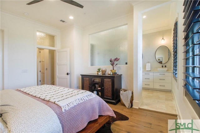 456 Port St, Savannah, GA 31401 - bedroom with light wood-style floors, ornamental molding, recessed lighting, and ensuite bathroom