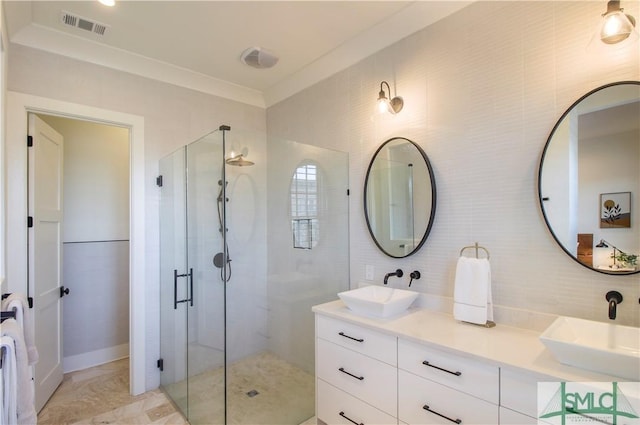 456 Port St, Savannah, GA 31401 - full bath featuring a shower stall, tile walls, double vanity, and backsplash