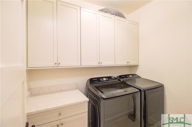456 Port St, Savannah, GA 31401 - washroom featuring washing machine and dryer and cabinet space