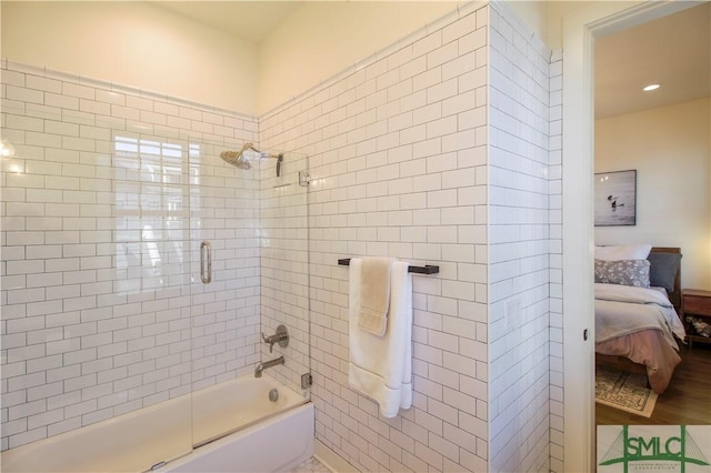 456 Port St, Savannah, GA 31401 - ensuite bathroom with bath / shower combo with glass door and wood finished floors
