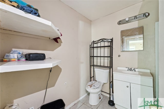 3808 Elmdale Ave, Savannah, GA 31405 - bathroom featuring toilet, tile patterned flooring, and vanity