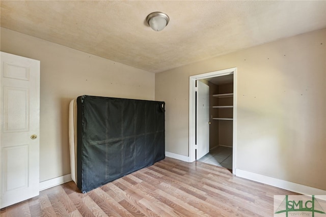 3808 Elmdale Ave, Savannah, GA 31405 - unfurnished bedroom featuring light wood-type flooring and baseboards