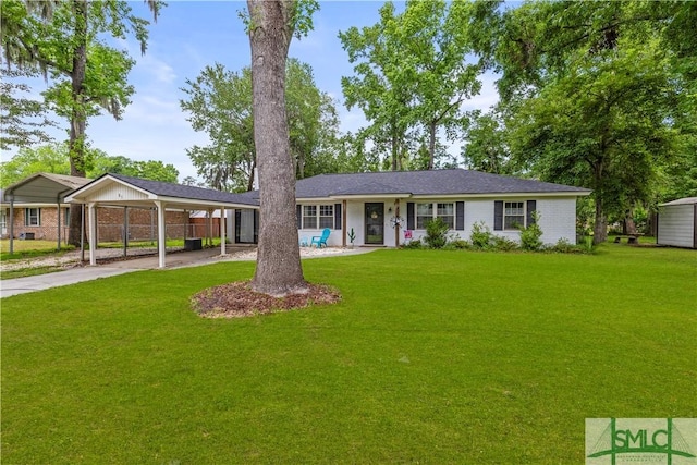 81 Quail Ln, Richmond Hill, GA 31324 - ranch-style house featuring a carport and concrete driveway