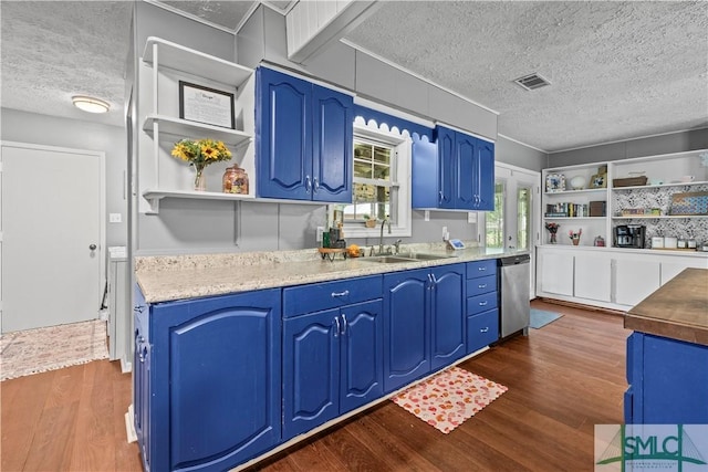81 Quail Ln, Richmond Hill, GA 31324 - kitchen with open shelves, a sink, a textured ceiling, dark wood finished floors, and blue cabinetry