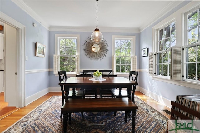405 E 55th St, Savannah, GA 31405 - dining space featuring healthy amount of natural light, baseboards, and ornamental molding