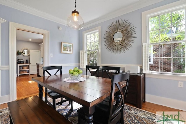 405 E 55th St, Savannah, GA 31405 - dining space with wood finished floors and crown molding