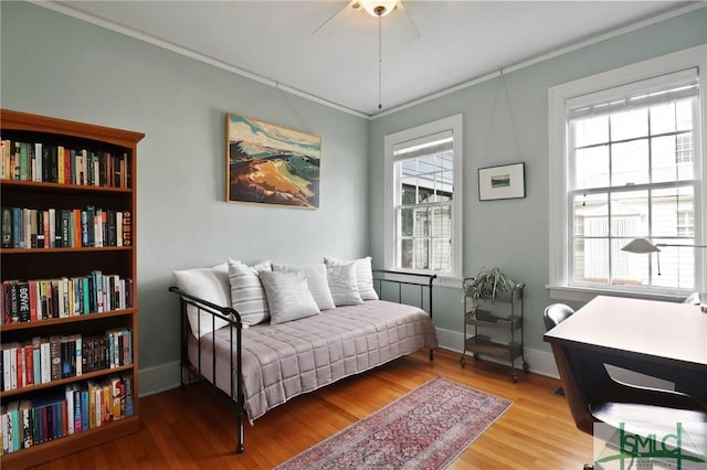 405 E 55th St, Savannah, GA 31405 - sitting room with crown molding, ceiling fan, healthy amount of natural light, and wood finished floors