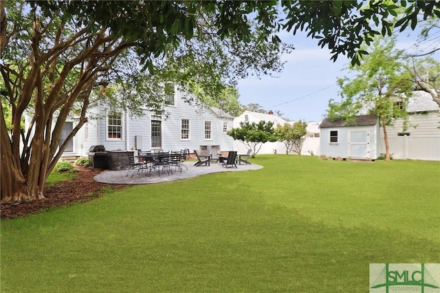 405 E 55th St, Savannah, GA 31405 - view of yard with a patio area, a shed, and an outdoor structure