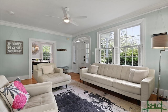 405 E 55th St, Savannah, GA 31405 - living area with ornamental molding, ceiling fan, wood finished floors, and baseboards