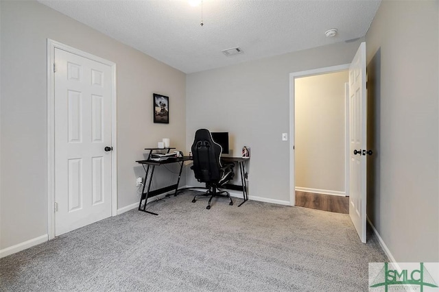 105 Pointe S Dr, Hinesville, GA 31313 - carpeted office featuring a textured ceiling and baseboards