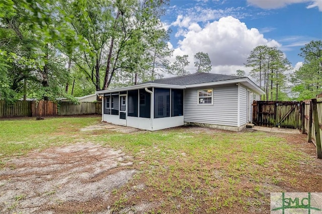 105 Pointe S Dr, Hinesville, GA 31313 - back of property with a sunroom