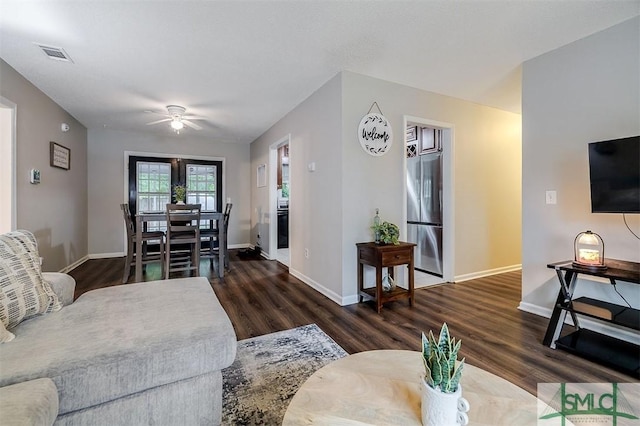 105 Pointe S Dr, Hinesville, GA 31313 - living room featuring wood finished floors, a ceiling fan, and baseboards