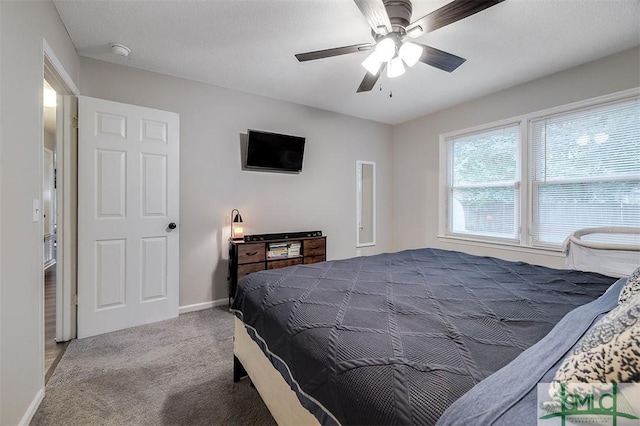105 Pointe S Dr, Hinesville, GA 31313 - bedroom with carpet floors, baseboards, and a ceiling fan