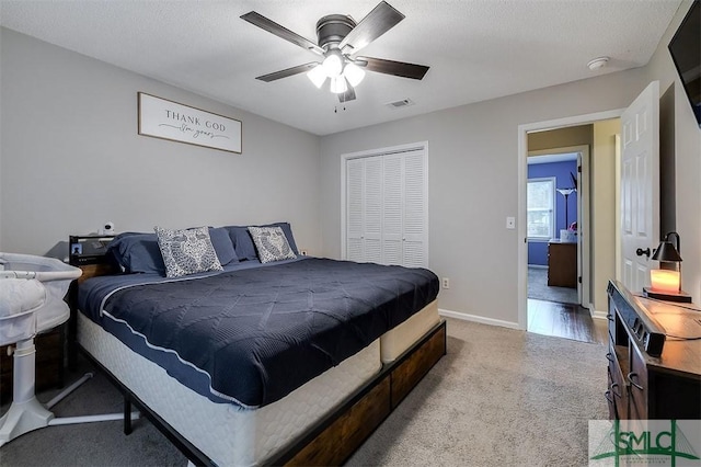 105 Pointe S Dr, Hinesville, GA 31313 - bedroom featuring carpet flooring, a closet, a ceiling fan, and baseboards